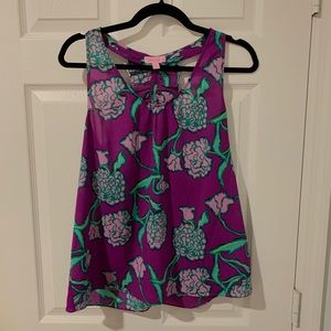 Purple sleeveless blouse
